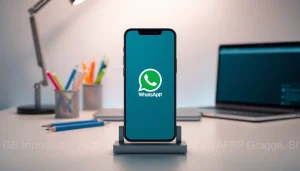 GB WhatsApp app displayed on a modern smartphone in an inviting workspace.